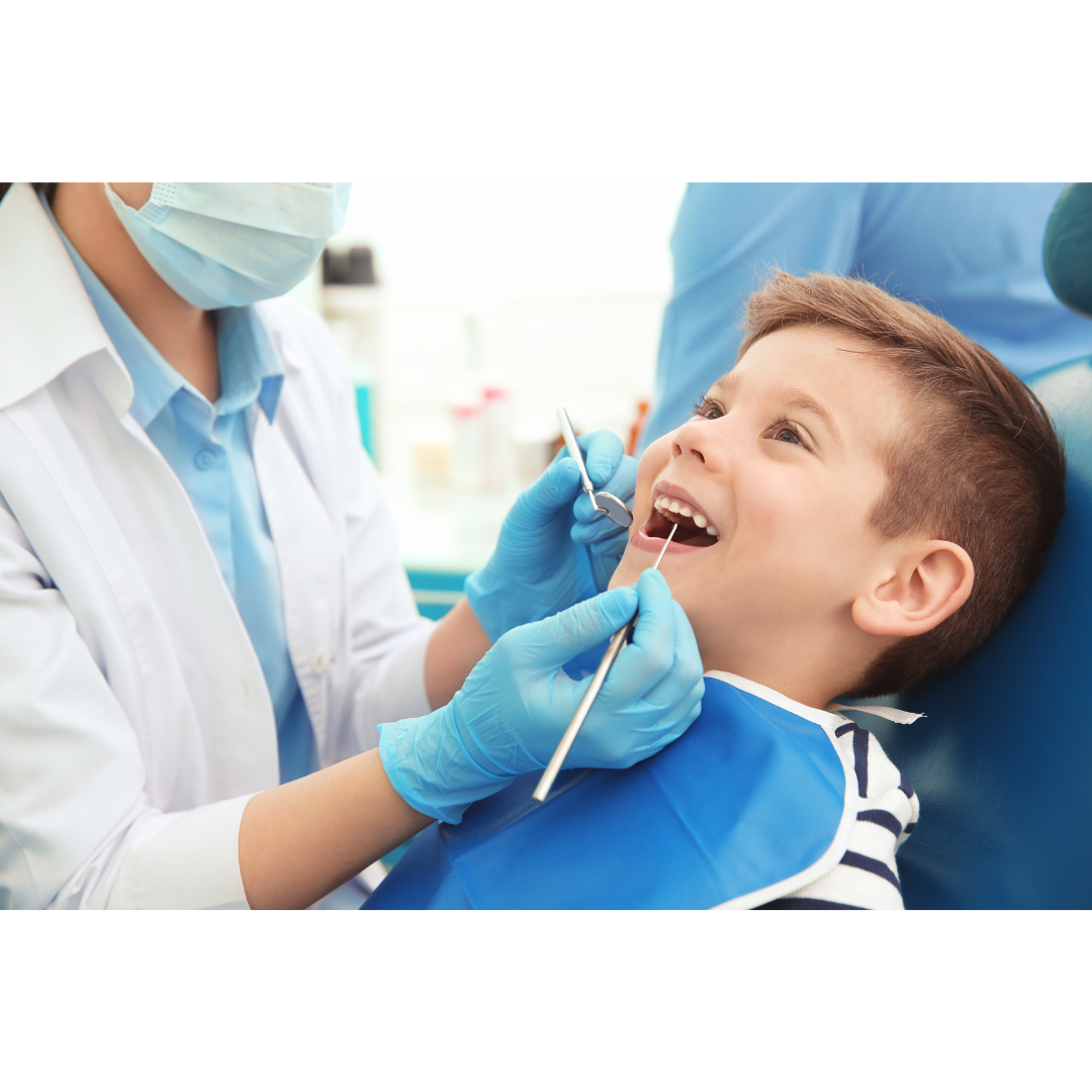 Dentist checking kid's Teeth